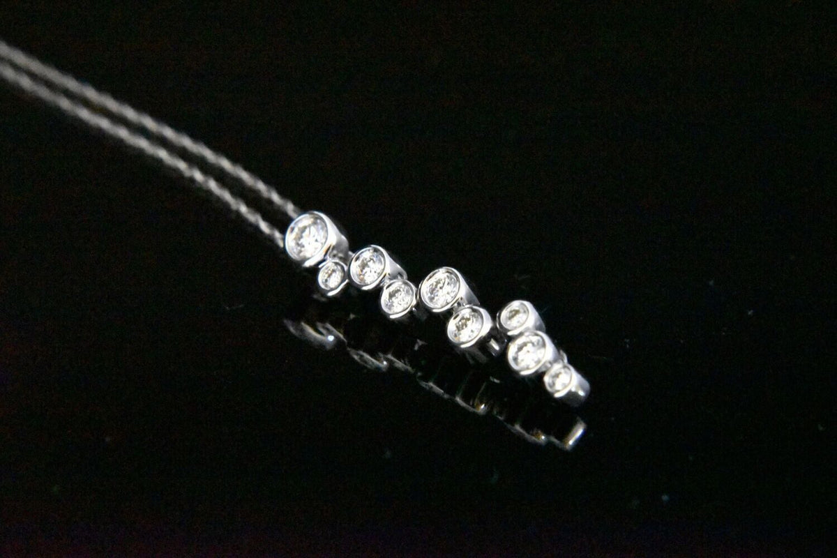 Diamond Pendant in 18KWG – White Diamonds: 0.17Ct