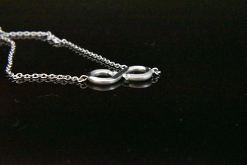 Diamonds Infinity Bracelet in Platinum