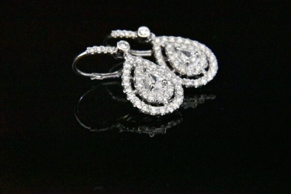 Diamond pear-shaped drop earrings.