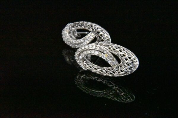 Diamond earrings, silver filigree design.