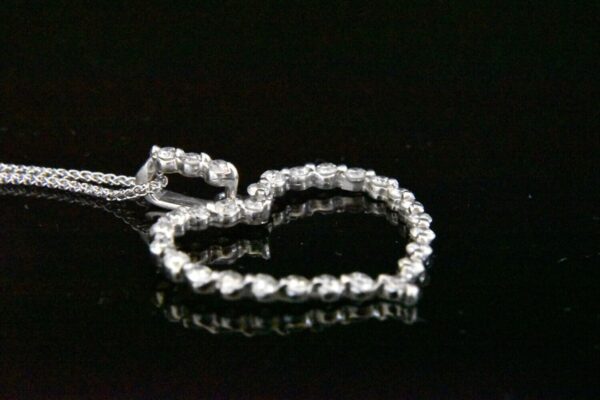 Diamond heart pendant necklace.