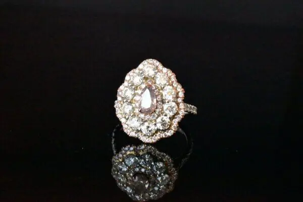 Rose gold pear diamond cluster ring.