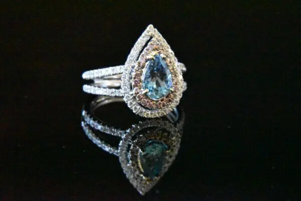 Diamond and aquamarine pear-shaped ring.