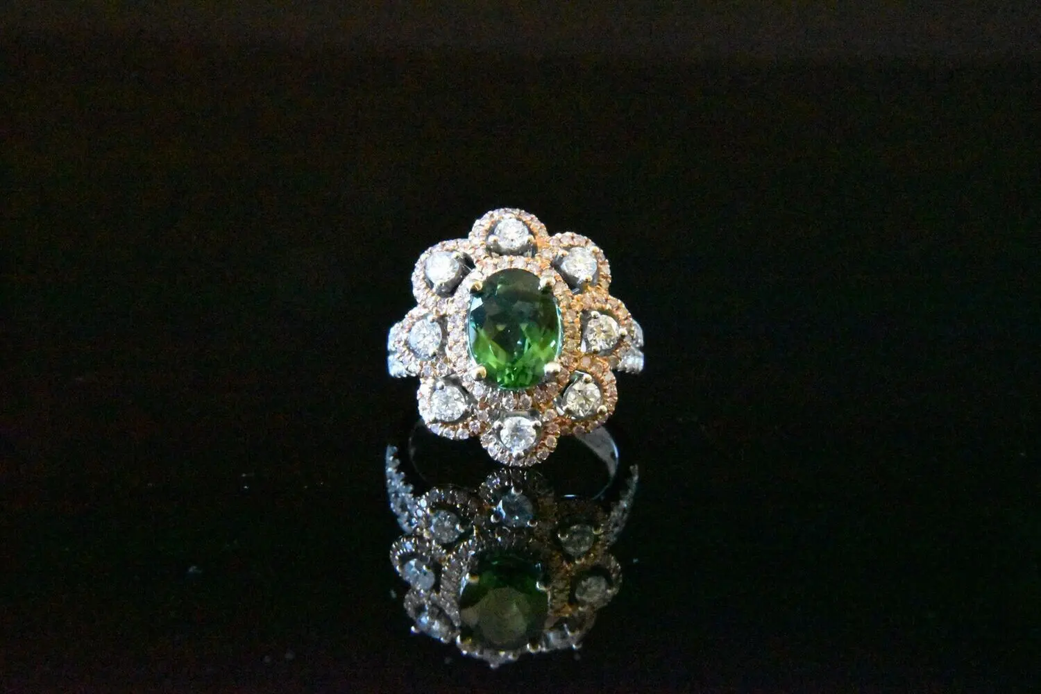 Green tourmaline and diamond ring.