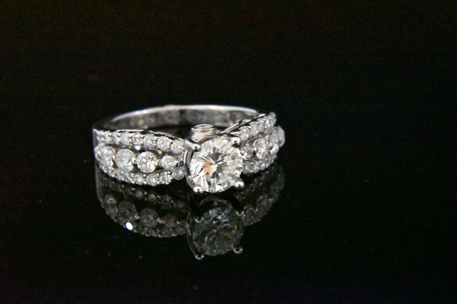 Diamond ring with pave setting.