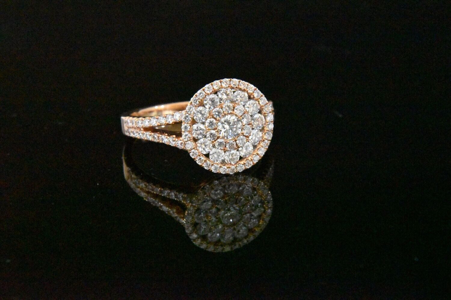 Rose gold diamond ring with double halo.