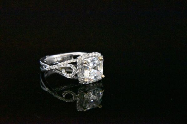 Diamond engagement ring with halo setting.