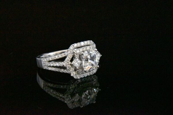 Diamond engagement ring with halo setting.