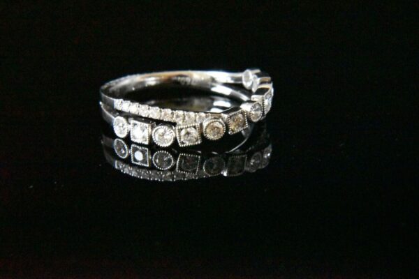 Diamond ring with pave setting.