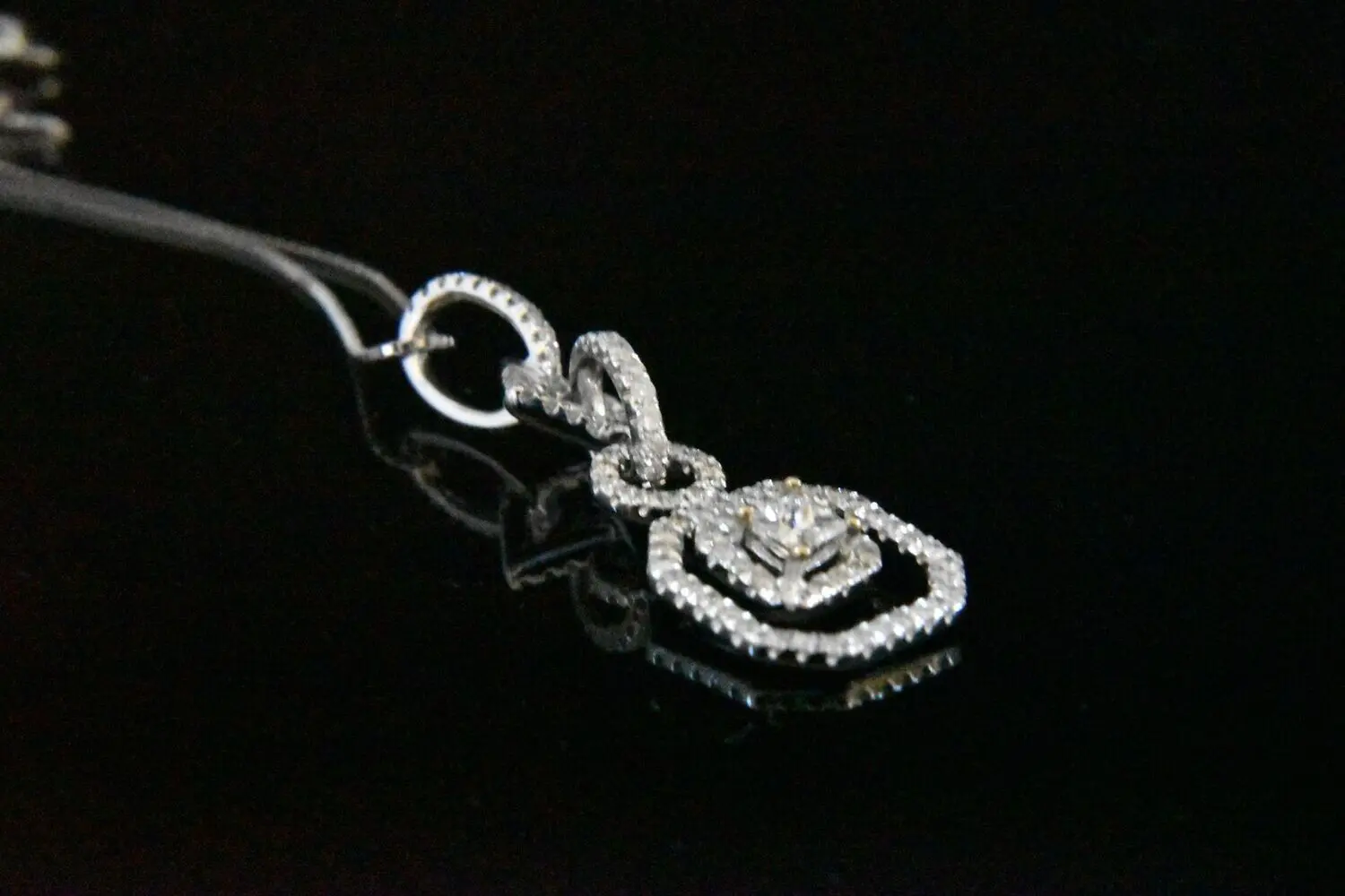 Diamond pendant necklace, elegant design.