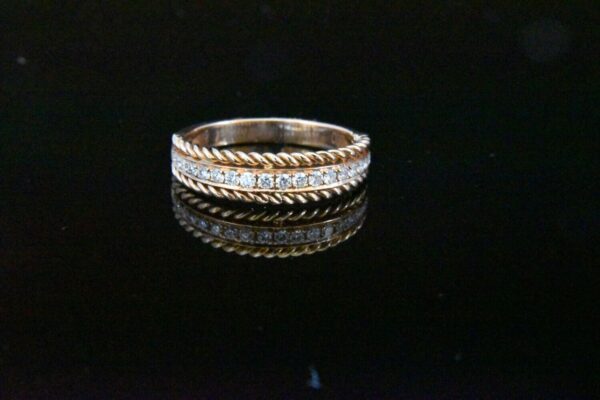 Rose gold diamond rope band ring.