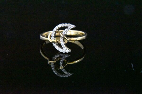 Diamond crescent moon and star ring.