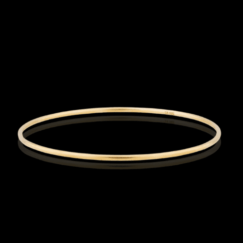 Gold bangle bracelet, simple design.