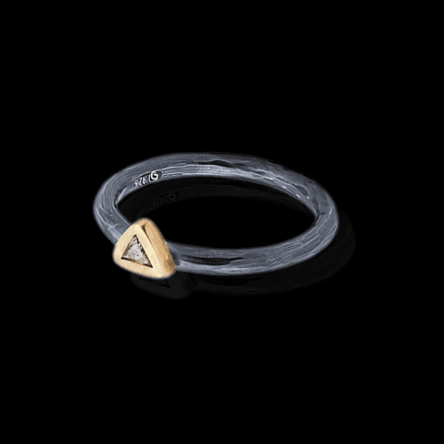 Black ring with gold triangle diamond.