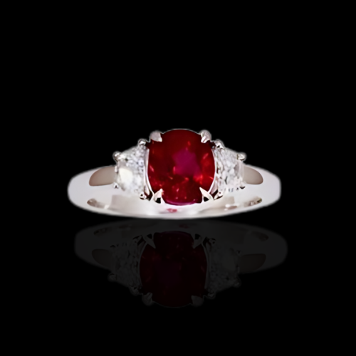 Ruby and diamond three-stone ring.