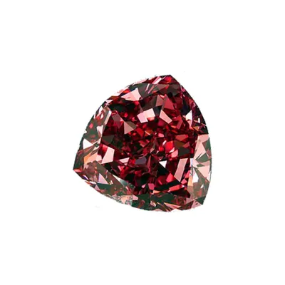 A red diamond is sitting on top of the table.